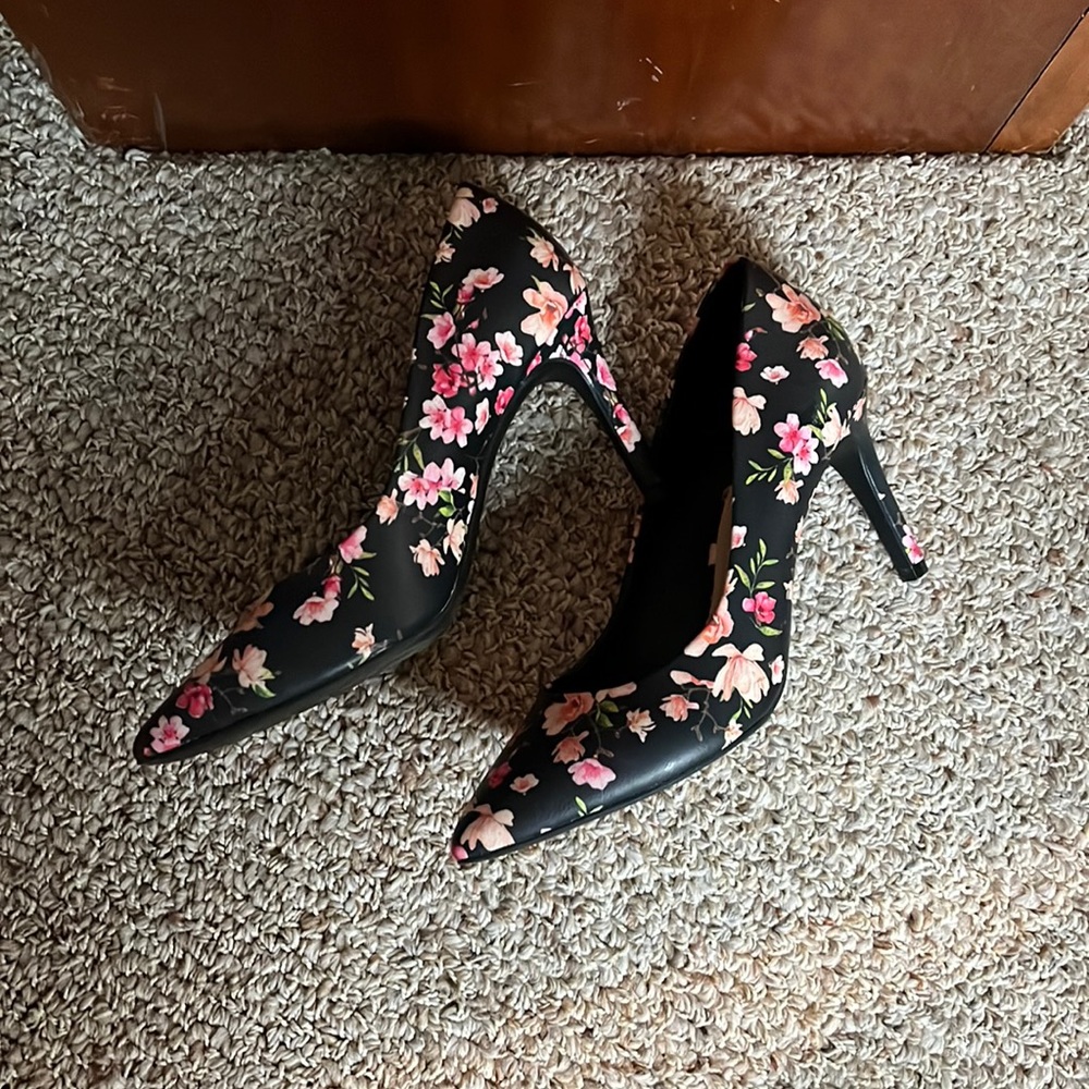 Flowered high heel shoes